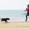 Racing Belt in action - Running with the dog at the beach - Front view